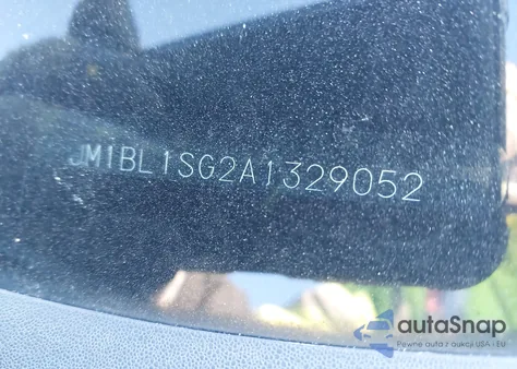 2010 Mazda Mazda3 I Touring z USA, uszkodzony, nr VIN JM1BL1SG2A1329052